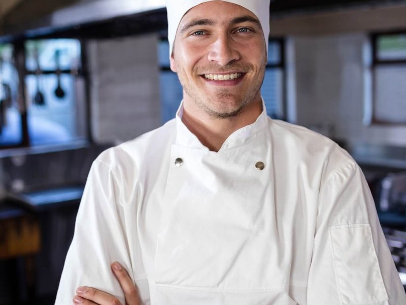 male-chef-standing-with-arms-crossed-in-kitchen.jpg